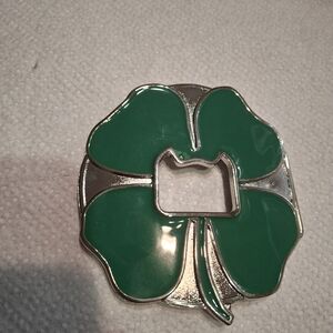 A GREEN ENAMEL BRAND NEW BELT BUCKLE AND BOTTLE OPENER FOUR LEAF CLOVER